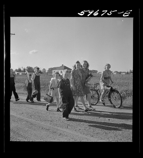 Children coming home from school. Two Rivers Non-Stock Cooperative Company, FSA (Farm Security Administration) co-op. Waterloo, Nebraska