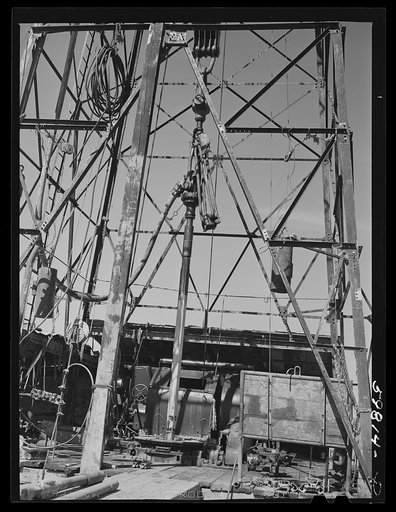 Untitled photo, possibly related to: Preparing to drill an oil well in Goodrich field of Continental oil company. Valley Center oil field near Wichita, Kansas