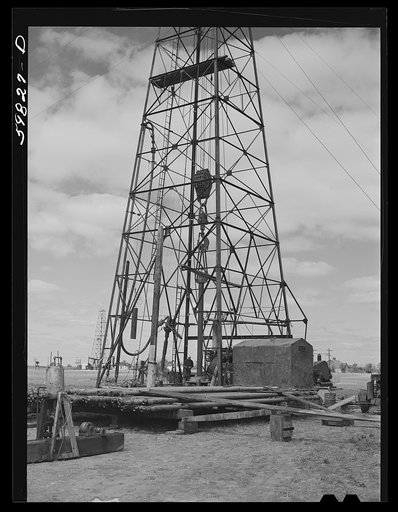 Preparing to drill an oil well in Goodrich field of Continental oil company. Valley Center oil field near Wichita, Kansas