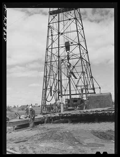 Untitled photo, possibly related to: Preparing to drill an oil well in Goodrich field of Continental oil company. Valley Center oil field near Wichita, Kansas