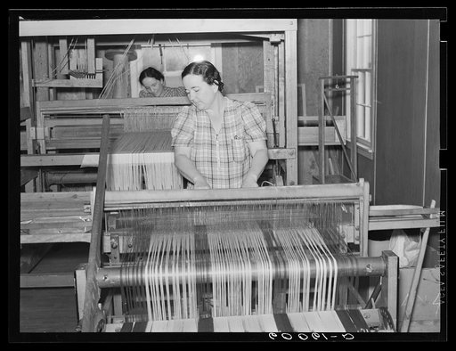 Homesteader weaving at Tygart Valley Homesteads, West Virginia