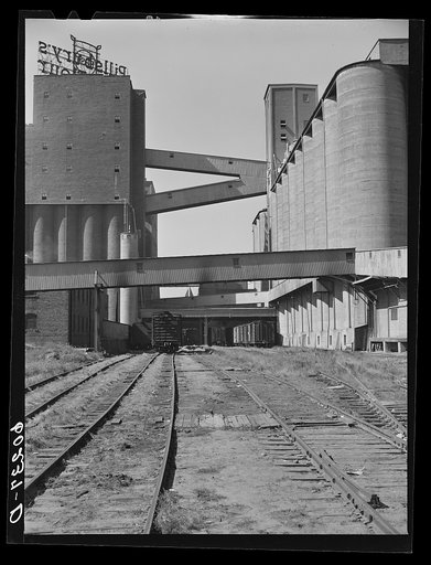 Untitled photo, possibly related to: Truck loading up with cattle feed at Pillsbury flour mill. Minneapolis, Minnesota