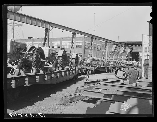 Tractors on railroad cars at Minneapolis-Moline Company. Minneapolis, Minnesota