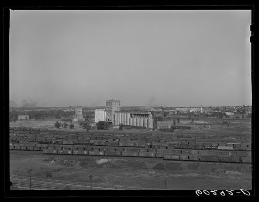 Freight cars and grain elevators. Minneapolis, Minnesota