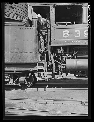 Railroad locomotive in grain elevator district. Minneapolis, Minnesota