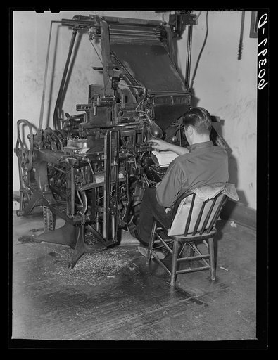 Operating linotype machine. Office of the Valley News. Browns Valley, Minnesota