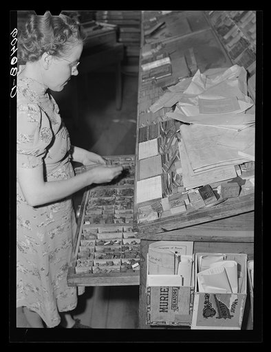 Editor of the Valley News picking out type. Browns Valley, Minnesota