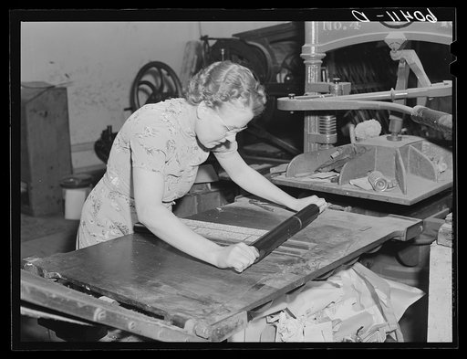 Editor of the Valley News inking column of type. Browns Valley, Minnesota