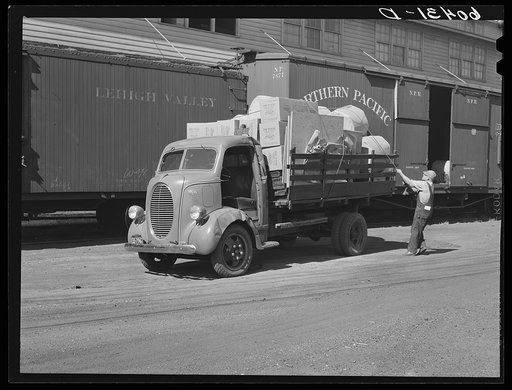 Truck driver who operates between Twin Cities and radius of 150 miles tying in load. Minneapolis, Minnesota