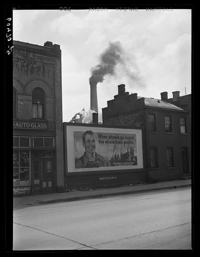 Dubuque's largest industry in background: sash and door company. Employs 1,500 men during peak. Dubuque, Iowa