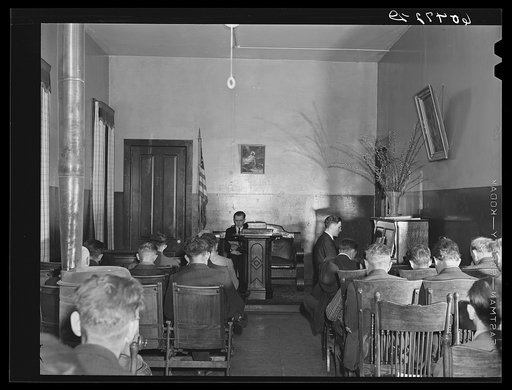 Untitled photo, possibly related to: Visiting preacher conducting evening service at city mission. Dubuque, Iowa