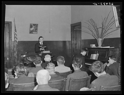 Untitled photo, possibly related to: Visiting preacher conducting evening service at city mission. Dubuque, Iowa