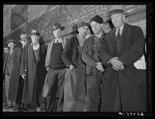 Men waiting in line outside the city mission--the first twenty-five will be fed. Dubuque, Iowa