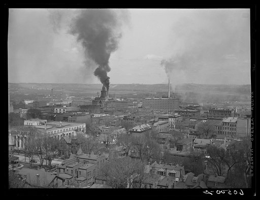 Dubuque, Iowa. The smoke comes from Dubuque's largest industry, the sash and door mills