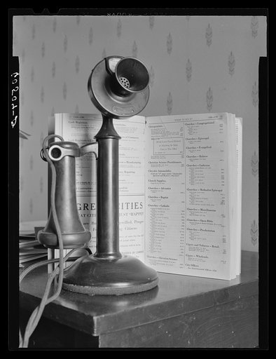Untitled photo, possibly related to: Page of telephone directory. Dubuque, Iowa