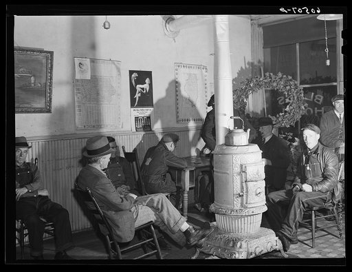 Untitled photo, possibly related to: Men in lobby of thirty-five cents hotel. Dubuque, Iowa