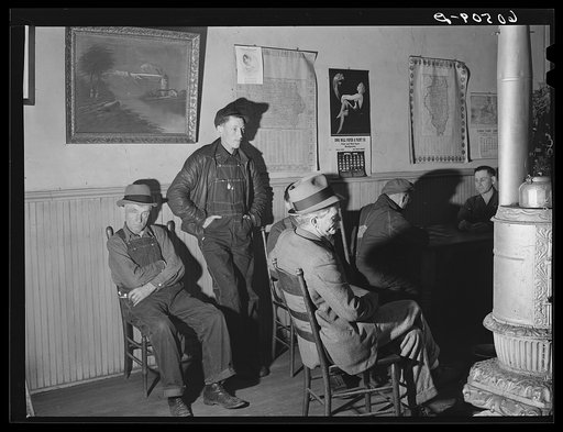 Men in lobby of thirty-five cents hotel. Dubuque, Iowa