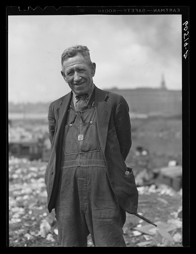 Resident of shack town along river bottoms. Dubuque, Iowa. He scavenges the city dump daily for scrap iron, bits of metal, etc.
