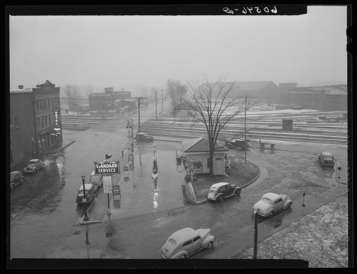 Untitled photo, possibly related to: Gas station on rainy day. Dubuque, Iowa