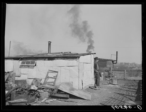 Homes in shack town along bottoms of Mississippi River. Dubuque, Iowa