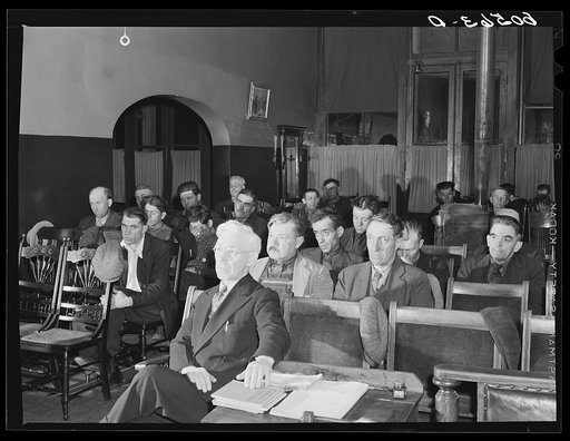 Listening to sermon at city mission. The white-haired man in foreground is a Baptist minister in charge of the mission. Dubuque, Iowa