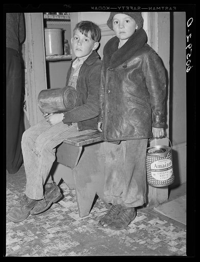 Untitled photo, possibly related to: Young boys waiting in kitchen of city mission for soup which is given out nightly. Dubuque, Iowa