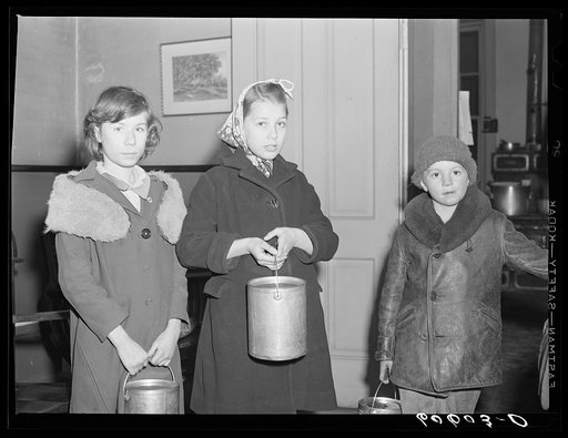 Children of poor families bring their pails to the city mission for soup which may be left over after twenty-five men have been fed. Dubuque, Iowa