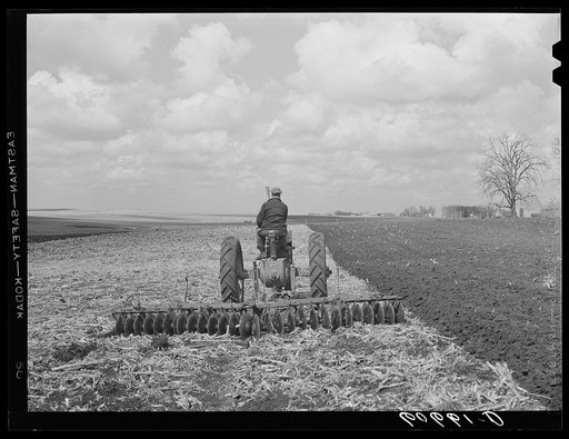 Breaking up cornstalks with disc. Grundy County, Iowa