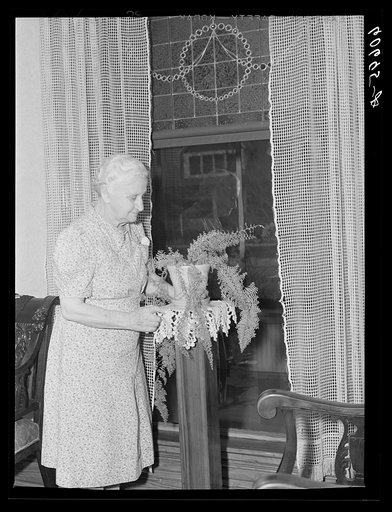 Woman in parlor of home. Scranton, Iowa