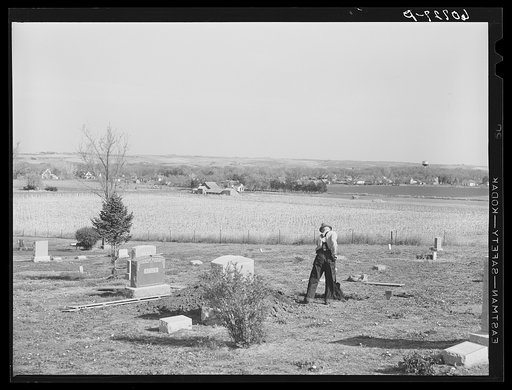 Digging a grave. Graveyard on the outskirts of Woodbine, Iowa