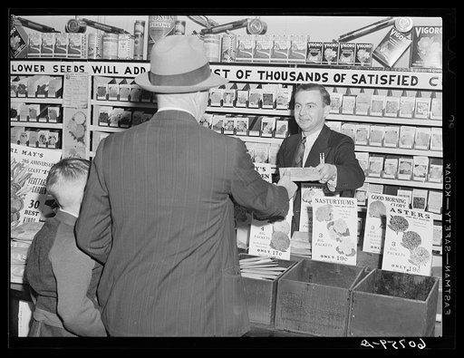 Making a sale. Seed store, Marshalltown, Iowa