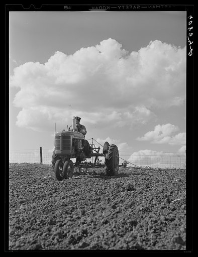 Corn planting with two-row tractor planter. Jasper County, Iowa