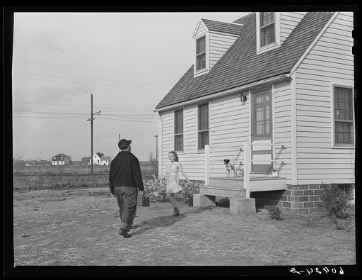 Coal miner coming home from work. Granger Homesteads, Iowa