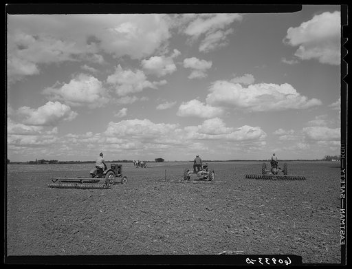 Getting the ground ready for corn planting. Jasper County, Iowa