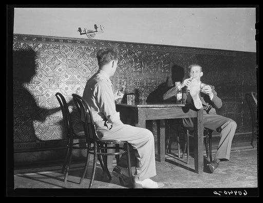 Untitled photo, possibly related to: Young couples in beer parlor. Cairo, Illinois