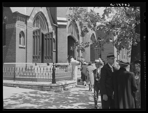 Talking in front of church on Sunday morning. Jefferson City, Missouri