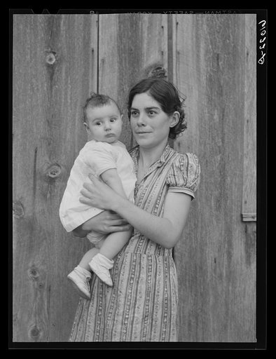 Mother and child living on Ozark Mountain farm, Missouri