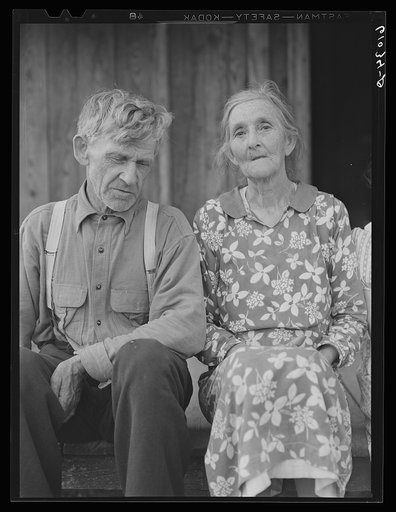 Old farm couple on poor land in the Ozark Mountains. Missouri