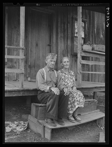 Old couple farming in the Ozark Mountains. Missouri