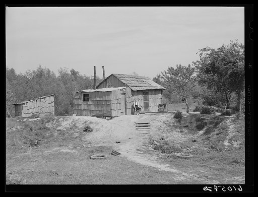House along often-flooded river bottoms, New Madrid County, Missouri. The family who lives here will move to one of the new Delmo labor homes