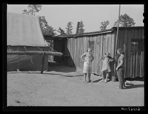 Untitled photo, possibly related to: Daughters of farmer living on sub-marginal land along Mississippi riverbottoms. The family will move to one of the new Delmo labor homes. New Madrid County, Missouri