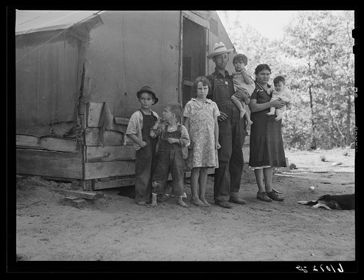 Untitled photo, possibly related to: Farmer and family living in tent on poor land of Mississippi riverbottoms. They will move to one of the Delmo labor homes. New Madrid County, Missouri