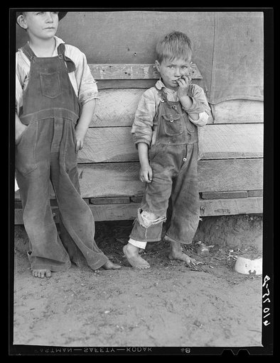Untitled photo, possibly related to: Children of family living on the other side of the levee, along Mississippi riverbottoms. They will move to one of the new Delmo labor homes. New Madrid County, Missouri
