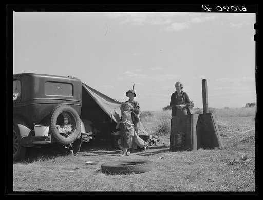 Migrant family from Tennessee camped in field on outskirts of town, about two blocks from water supply. Berrien County, Michigan