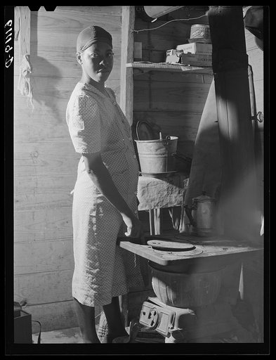 Wife of migrant fruit picker. They live in a one-room windowless shack on property of grower. Berrien County, Michigan