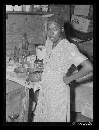 Wife of migrant fruit picker. They live in a one-room windowless shack on property of grower. Berrien County, Michigan
