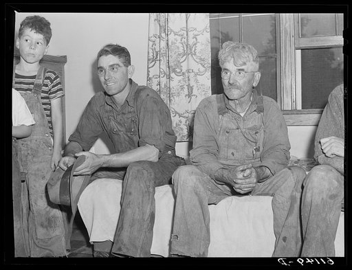 Untitled photo, possibly related to: Michigan fruit grower and his two sons. Berrien County, Michigan