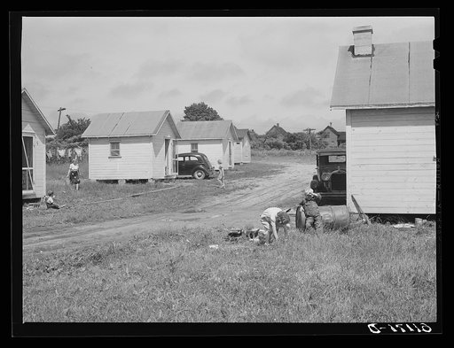 Untitled photo, possibly related to: Cabins rented for one dollar and seventy-five cents a week by migratory fruit pickers and packing house workers. Berrien County, Michigan