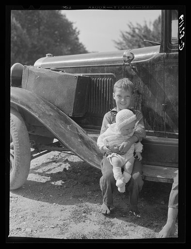 Children of migratory fruit worker Berrien County, Michigan. Boys this age often do a full day's work in strawberries or cherries