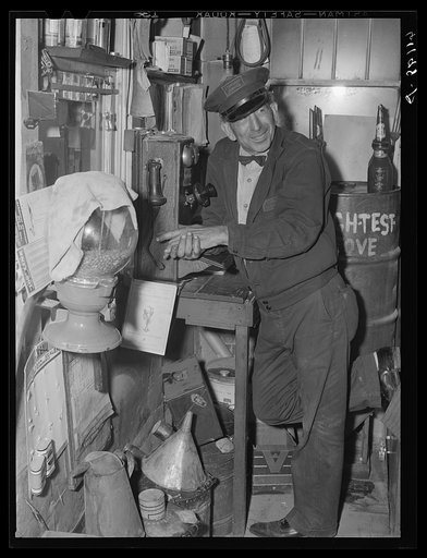 Gas station attendant. Millburg, Michigan